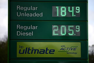 The price per litre of unleaded petrol and diesel fuels, with diesel at over GBP two pounds sterling per litre, are pictured outside a BP petrol station on the M4 motorway, west of London, April 16, 2026.