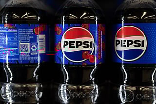 Bottles of Pepsi products are displayed for sale at Hawthorne Market on Tuesday, Jan. 6, 2026, in Portland, Ore. (AP Photo/Jenny Kane)