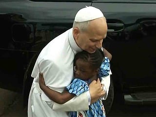 Girl’s emotional hug with Pope after Cameroon mass