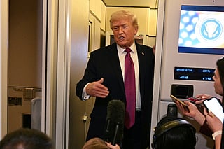US President Donald Trump speaks to the press aboard Air Force One before arriving at Joint Base Andrews in Maryland on April 17, 2026 after a two-day trip to Nevada and Arizona.