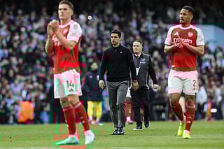 Arsenal's Spanish manager Mikel Arteta (C) reacts at the end of the English Premier League football match between Manchester City and Arsenal at the Etihad Stadium in Manchester, north west England, on April 19, 2026.