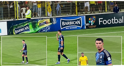 Ronaldo shushing the crowd who chanted for Messi