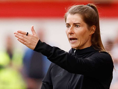 Union Berlin's German head coach Marie-Louise Eta gestures from the sidelines during the German first division Bundesliga football match between Union Berlin and VfL Wolfsburg in Berlin, Germany, on April 18, 2026. 