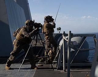 US forces near the Strait of Hormuz. Iranian officials insist the strait remains under their "supervision" and "open" to commercial traffic, but US enforcement has seized vessels.
