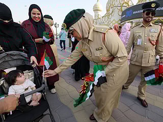 Dubai Police interact with visitors   