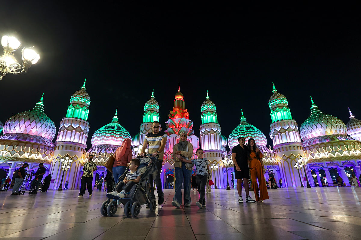 Visitors arrive during the night time at season 30 of Global Village which reopened after a month-long pause.
