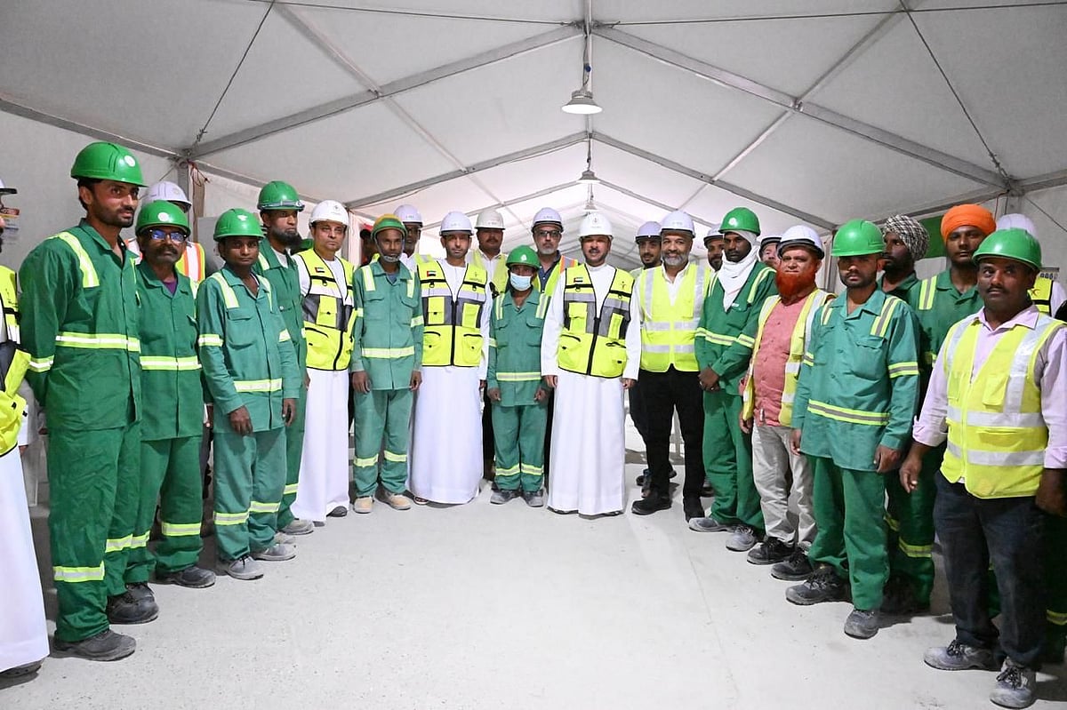 Officials review facilities and engage workers at Arab Construction Company site in Dubai