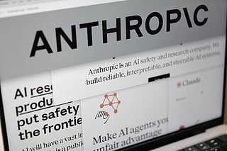 FILE - Pages from the Anthropic website and the company's logo are displayed on a computer screen in New York on Feb. 26, 2026. (AP Photo/Patrick Sison, File)