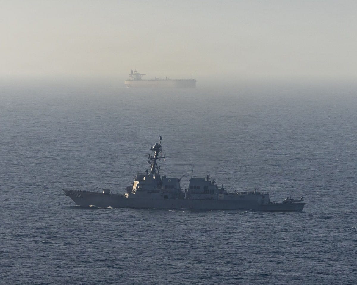 This US Navy handout photograph released on April 21, 2026, by US Central Command Public Affairs shows Arleigh Burke-class guided-missile destroyer USS Michael Murphy patrolling the Arabian Sea during a maritime blockade on April 15, 2026.