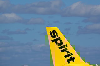 FILE - The tail of a Spirit Airlines Airbus A320 is shown as the plane prepares to take off from Fort Lauderdale-Hollywood International Airport, Jan. 19, 2021, in Fort Lauderdale, Fla. (AP Photo/Wilfredo Lee, File)