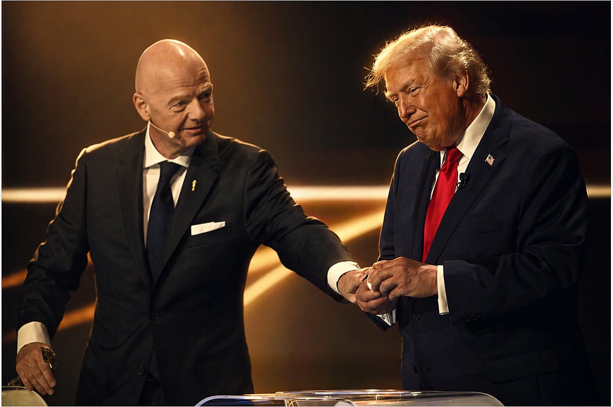 FIFA President Gianni Infantino pauses President Donald Trump during the draw for the 2026 FIFA World Cup at the Kennedy Center in Washington, Friday, Dec. 5, 2025. 