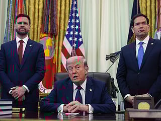 President Donald Trump speaks as Secretary of State Marco Rubio, right, and Vice President JD Vance listen in the Oval Office at the White House, Thursday, April 23, 2026, in Washington.