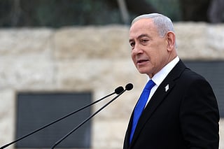 Israel's Prime Minister Benjamin Netanyahu attends a ceremony commemorating Israel's Remembrance Day for fallen soldiers, or Yom HaZikaron, at the Military Cemetery on Mount Herzl in Jerusalem, Tuesday April 21, 2026. (Ilia Yefimovich/Pool Photo via AP)