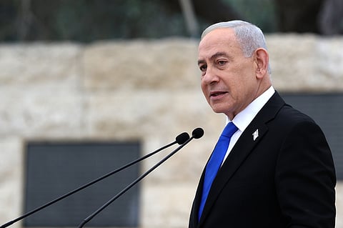 Israel's Prime Minister Benjamin Netanyahu attends a ceremony commemorating Israel's Remembrance Day for fallen soldiers, or Yom HaZikaron, at the Military Cemetery on Mount Herzl in Jerusalem, Tuesday April 21, 2026. (Ilia Yefimovich/Pool Photo via AP)