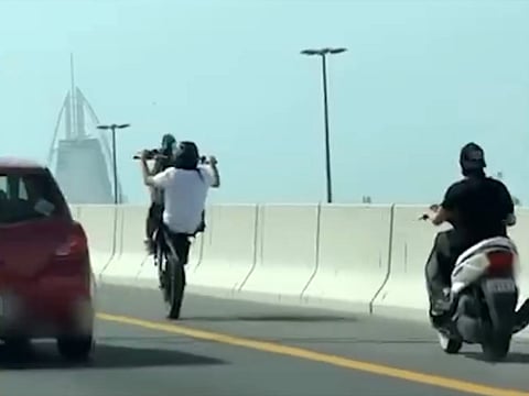 Riders filmed doing wheelies and weaving through traffic face legal action.