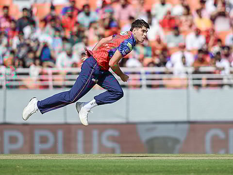 Punjab Kings' Xavier Bartlett bowls during the IPL 2026 match against Sunrisers Hyderabad, at Maharaja Yadavindra Singh International Cricket Stadium, in New Chandigarh.