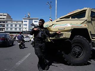 A member of Iran's police special forces stands guard in Tehran, on Friday, April 24, 2026.