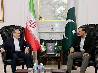 Iranian Foreign Minister Abbas Araghchi, left, meets with Pakistan's Army Chief Field Marshal Asim Munir in Islamabad, Pakistan, on Saturday, April 25, 2026. 