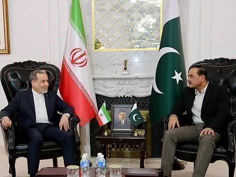 Iranian Foreign Minister Abbas Araghchi, left, meets with Pakistan's Army Chief Field Marshal Asim Munir in Islamabad, Pakistan, on Saturday, April 25, 2026. 