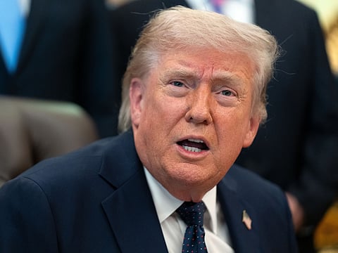 A ceasefire between Iran and the United States was teetering Monday as the two countries traded fire over the strategic Strait of Hormuz and the United Arab Emirates reported attacks for the first time since the truce was declared nearly a month ago.