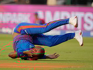 Delhi Capitals' Lungi Ngidi loses his balance while attempting to take a catch during the IPL 2026 match against Punjab Kings in New Delhi, on Saturday, April 25, 2026. 