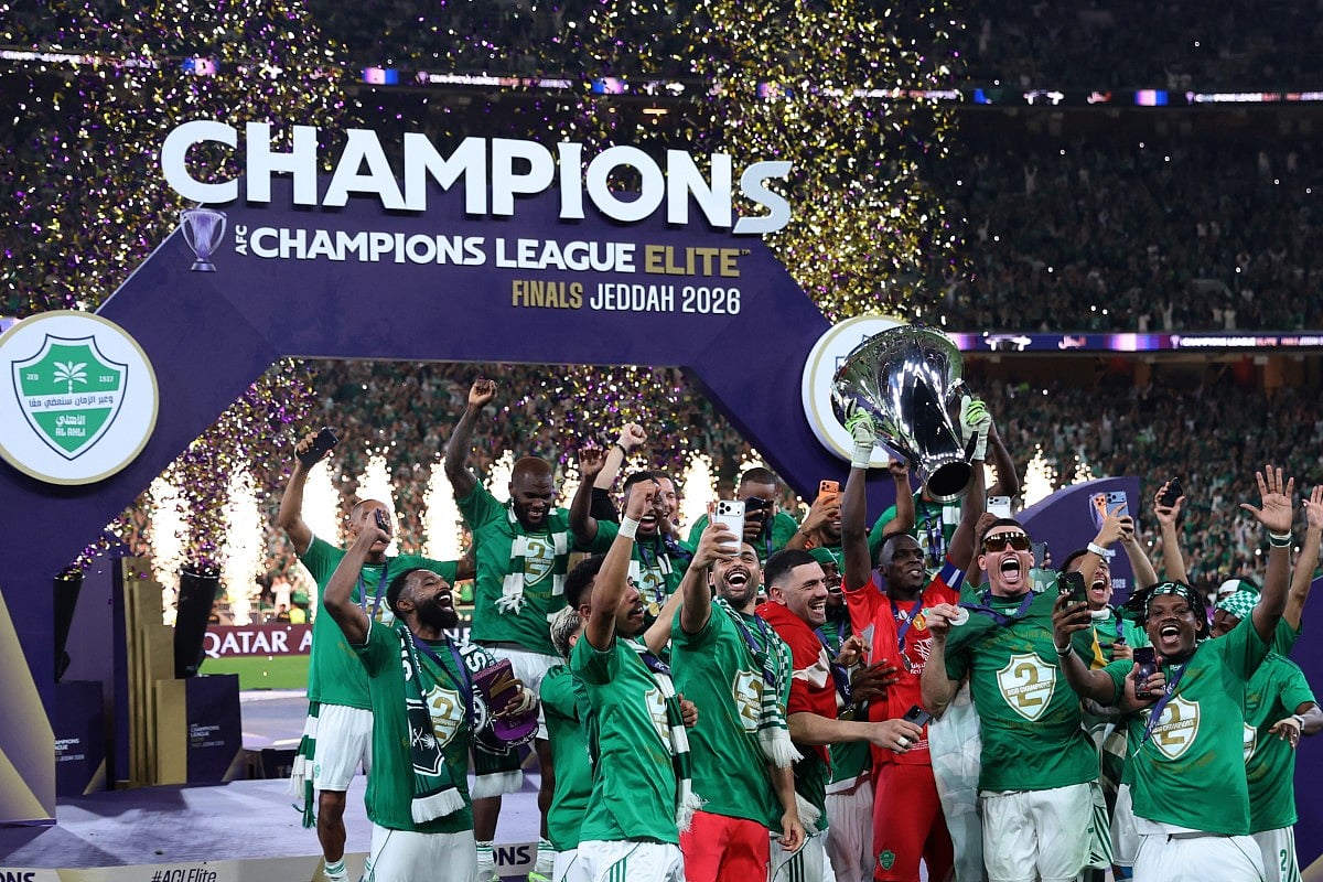 Al-Ahli players celebrate with the trophy after beating Machida Zelvia 1-0 in the final of the AFC Champions League football match between Al-Ahli Saudi FC and FC Machida Zelvia at the King Abdullah Sports City, in Jeddah on April 25, 2026.