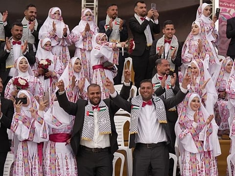 The ceremony, held last Friday in central Gaza, attracted large crowds of families, community leaders and representatives of local and international organisations, with organisers estimating attendance at around 20,000 people.