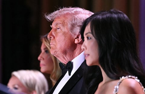 White House Press Secretary Karoline Leavitt, US First Lady Melania Trump, US President Donald Trump and CBS News senior White House correspondent Weijia Jiang attend the White House Correspondents' dinner at the Washington Hilton in Washington, DC, on April 25, 2026.