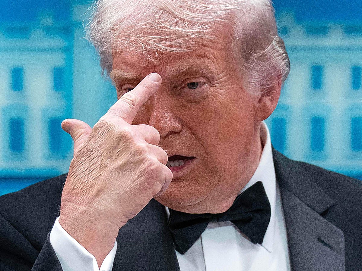 President Donald Trump gestures as he speaks in the James Brady Press Briefing Room at the White House after a shooting incident outside the ballroom at at the annual White House Correspondents' Association dinner in Washington.