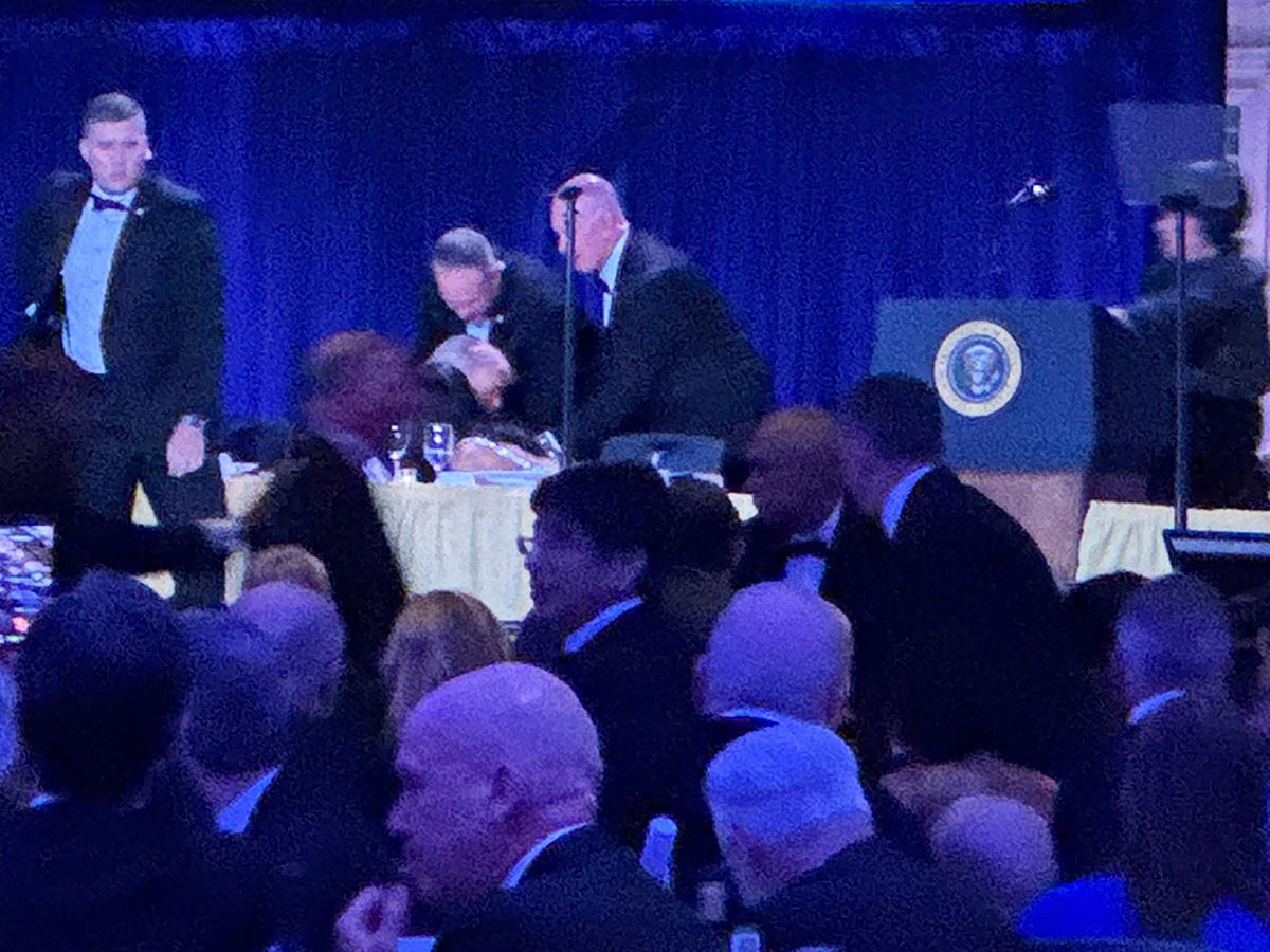 US Secret Service agents bundled Donald Trump from the stage as shots rang out Saturday evening at a media gala, in what the president later described as an attack by a "would-be assassin."