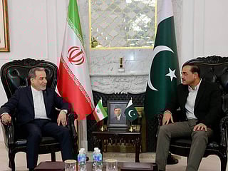 Iranian Foreign Minister Abbas Araghchi, left, meets with Pakistan's Army Chief Field Marshal Asim Munir in Islamabad, Pakistan, Saturday, April 25, 2026.