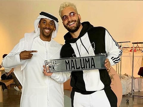 Musa Khalfan with Maluma at MK Barber shop