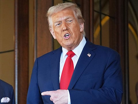 President Donald Trump has accused some of the world's largest oil companies of failing to pass lower crude oil prices on to consumers, warning his administration is probing potential "price gouging" at the petrol pump.