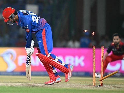 Delhi Capitals Indian cricket player Sahil Parakh is bowled out by Royal Challengers Bengaluru's Indian cricket player Bhuvneshwar Kumar during the 2026 Indian Premier League 