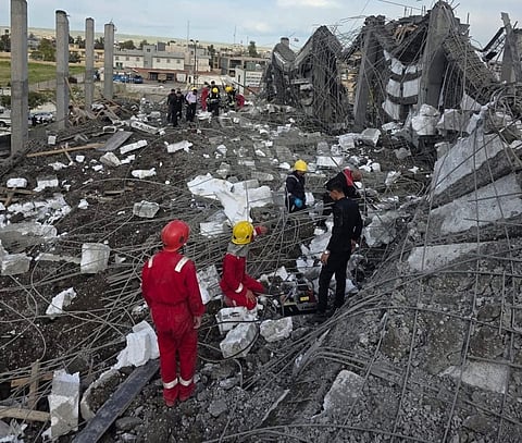 Civil defence teams rushed to the scene, managing to pull a number of workers from the rubble and recover the bodies of two workers