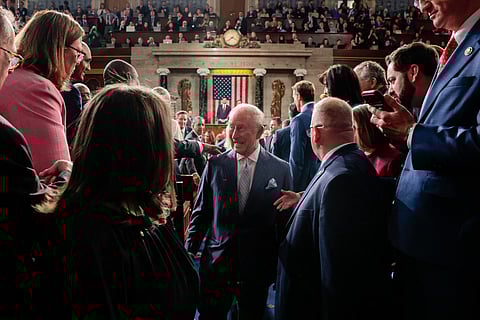 Britain's King Charles III is greeted by attendees after addressing a Joint Meeting of Congress in the House Chamber at the US Capitol in Washington, DC, on April 28, 2026.