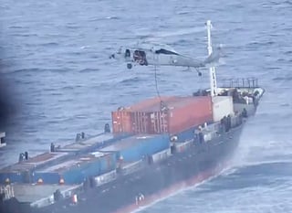 US Marines board the commercial ship M/V Blue Star III in the Arabian Sea, near the Strait of Hormuz.