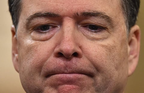 FBI Director James Comey looks on during the House Permanent Select Committee on Intelligence hearing on Russian actions during the 2016 election campaign on March 20, 2017 on Capitol Hill in Washington, DC.