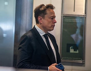Elon Musk arrives at the federal courthouse as opening statements begin in the trial over Elon Musk's lawsuit against OpenAI in Oakland, California, on April 28, 2026.