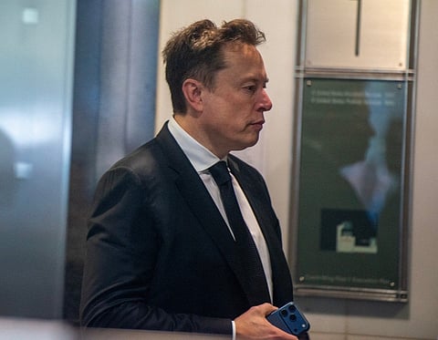 Elon Musk arrives at the federal courthouse as opening statements begin in the trial over Elon Musk's lawsuit against OpenAI in Oakland, California, on April 28, 2026.