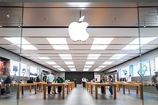 The Apple logo is seen at an Apple store in the Barton Creek Square mall on April 30, 2026 in Austin, Texas.