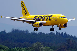 FILE - A Spirit Airlines 319 Airbus approaches Manchester Boston Regional Airport for a landing, June 2, 2023, in Manchester, New Hamshire.