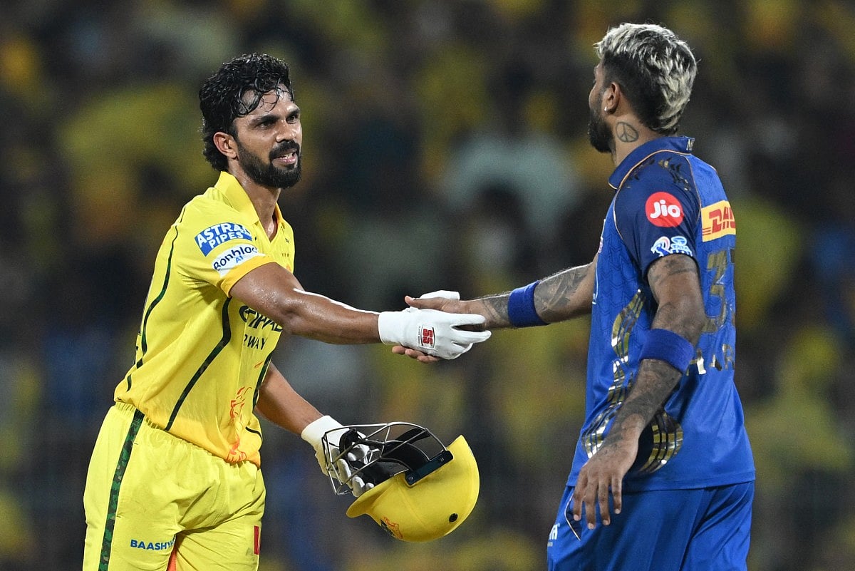 Mumbai Indians' captain Indian cricket player Hardik Pandya (R) congratulates Chennai Super Kings' captain Indian cricket player Ruturaj Gaikwad after winning the 2026 Indian Premier League (IPL) T20 match between Chennai Super Kings and Mumbai Indians at the MA Chidambaram Stadium in Chennai on May 2, 2026.