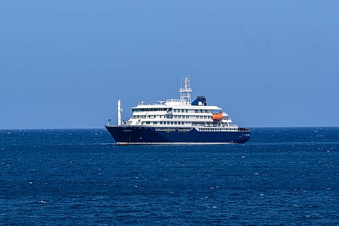 Three people have died on a cruise ship in the Atlantic, the WHO said Sunday, one a confirmed case of hantavirus, an illness usually transmitted to humans from rodents.