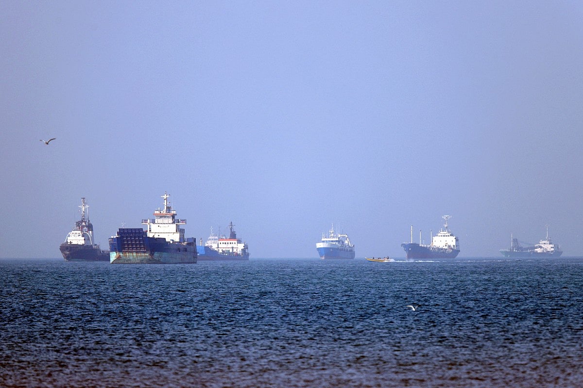 Vessels are pictured anchored in the Strait of Hormuz off Bandar Abbas in southern Iran. Analysts warn that even if the war subsides, Tehran may seek to preserve some form of strategic control over the passage.