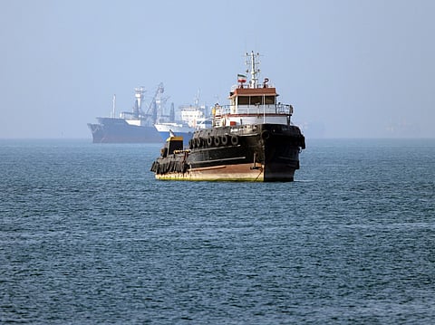 The French Navy's Carrier Strike Group that includes the flagship aircraft carrier Charles de Gaulle (unseen) and its escort transiting the Suez Canal en route to the southern Red Sea to pre‑position for a possible mission to restore navigation in the Strait of Hormuz.