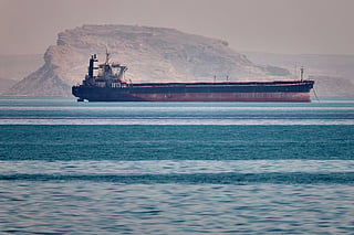 A bulk cargo ship sits at anchor in the Strait of Hormuz off Bandar Abbas, Iran. File photo taken on  May 2, 2026. 
