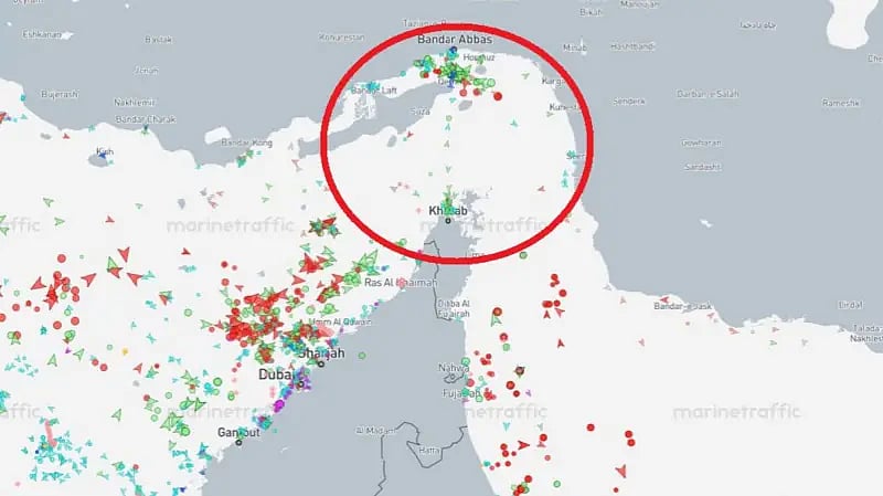 Tracking data shows ships either side of the narrow Strait of Hormuz, and near ports on the Iranian coast, but few in the strait itself - as identified by the red circle.