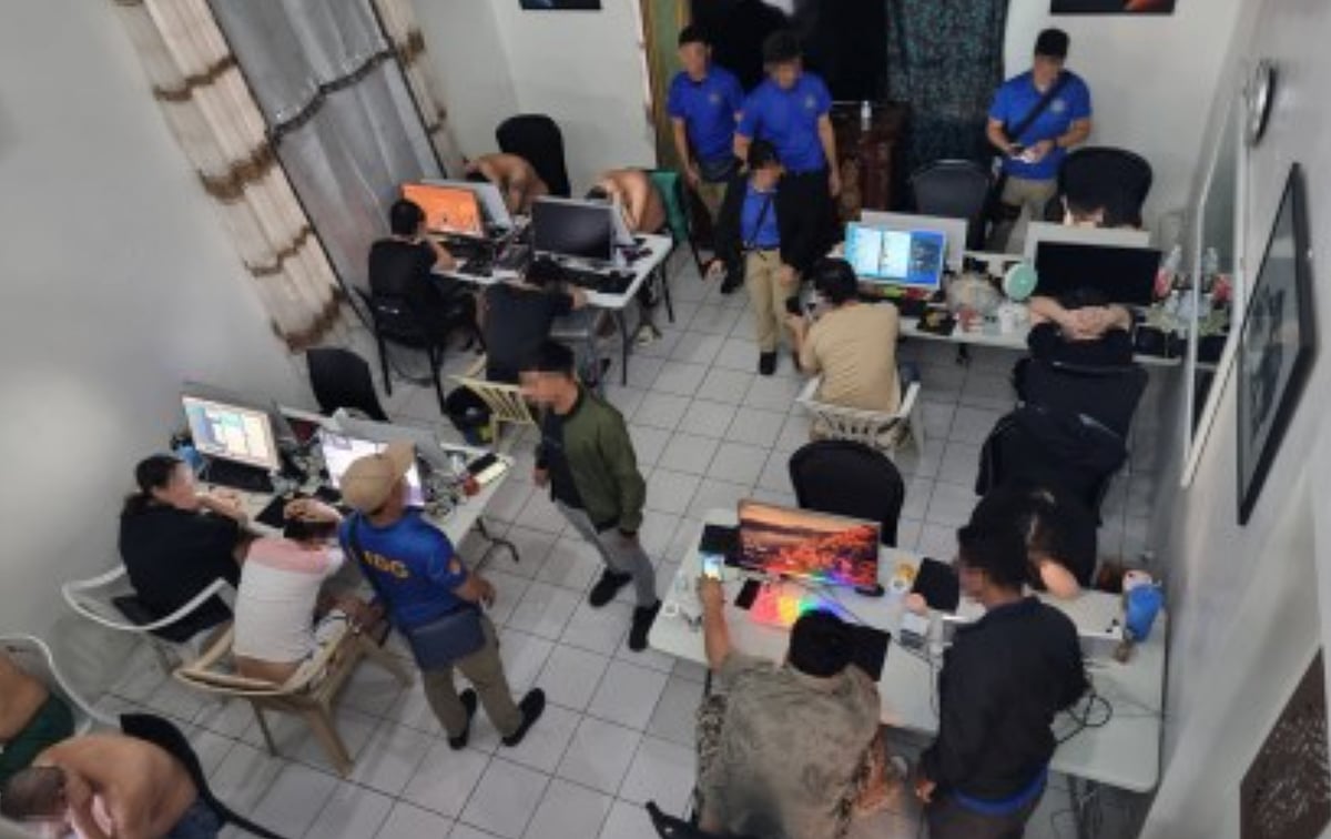 A scene of a Philippine police raid on a text scam hub in Subic, Zambales. File photo taken on September 4, 2024. Philippine police has ramped up its drive against illegal text blasters from shuttered offshore gaming ops, sold guerrilla-style online.