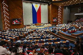 Philippine lawmakers attend a session at the House of Representatives in Quezon City, Metro Manila. File photo taken on May 11, 2026.